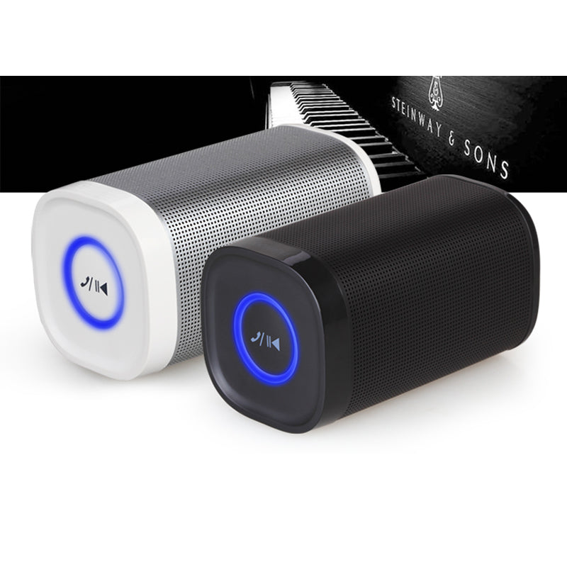 Wireless portable 360° Bluetooth speakers in white and black with illuminated control buttons.